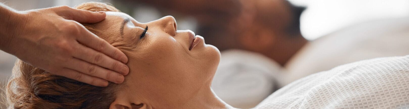 Client receiving a relaxing Tulsa Swedish massage as part of professional Tulsa massage therapy at Medical Massage of Tulsa.