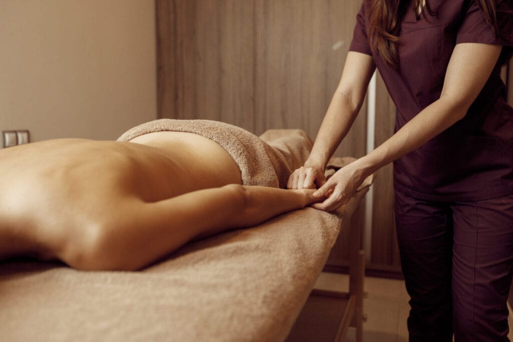 female masseur pampering hands to young slim woman 2024 12 03 21 42 10 utc Medical Massage of Tulsa