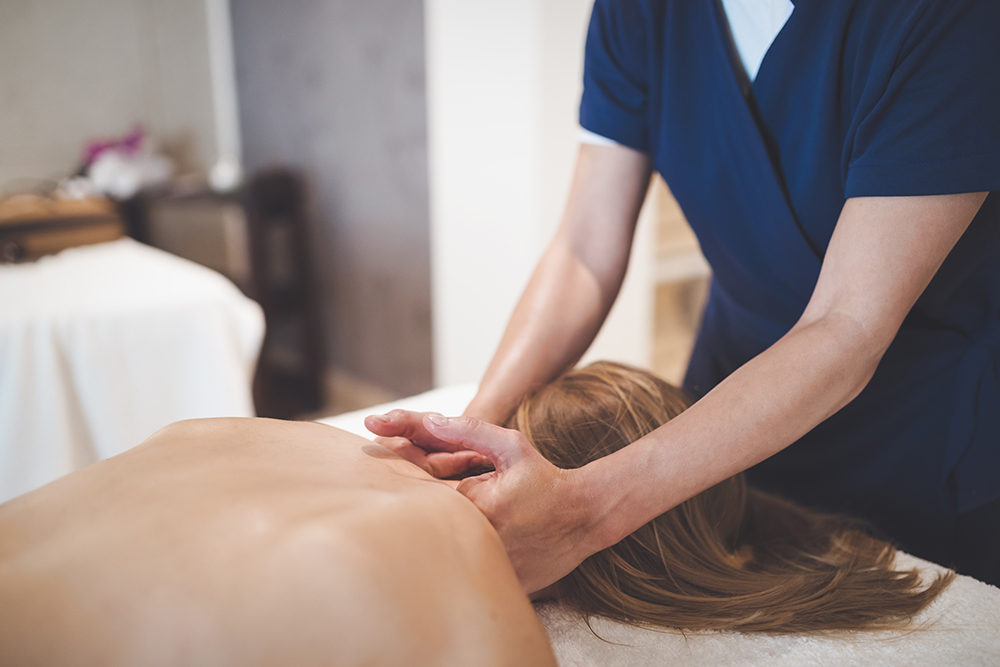 Personal Injury Massage Referrals in Tulsa with licensed massage therapist providing neck and shoulder massage